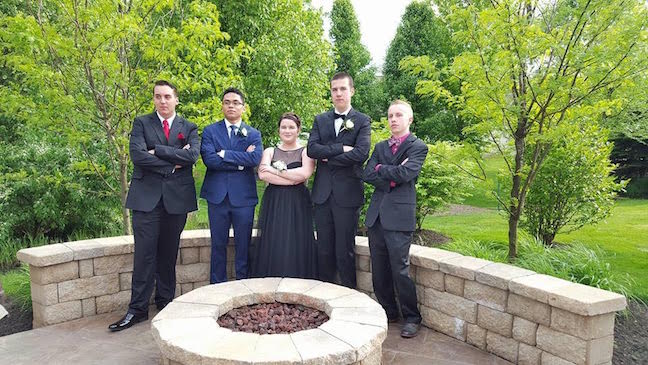 Students pose for prom pictures before the dance on May 7. Photo by Emma Russell.