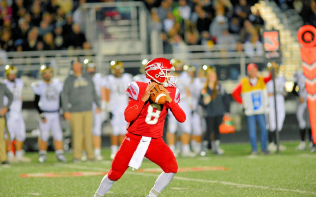 Junior quarterback Matthew Wolff gets ready to throw a pass on Oct. 28 against Noblesville. Tigers win 28-14. Photo courtesy of Fishers High School athletic website. 