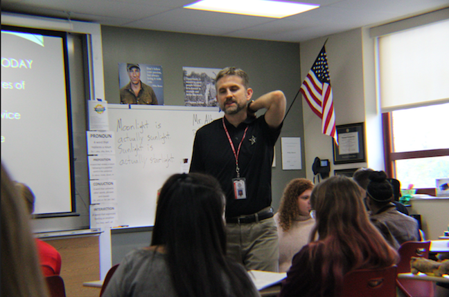 English teacher Phillip Albonetti discusses information about the SAT to his after school SAT Prep class. Photo by Mandy Lewellen.
