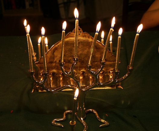 The Menorah is used during Hanukkah to represent the eight nights where they thought they would run out of oil for their lamps and be in darkness.  Photo courtesy of Scott. https://creativecommons.org/licenses/by-sa/2.0/