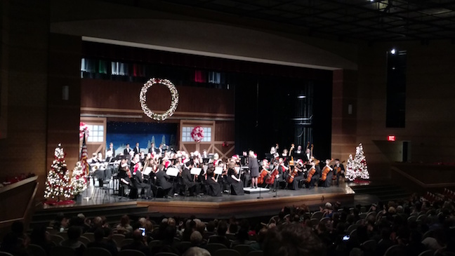 The Philharmonic Orchestra playing their last melody on the stage decorated with Winter ornaments on Dec.7th. Photo taken by Seana Jordan.