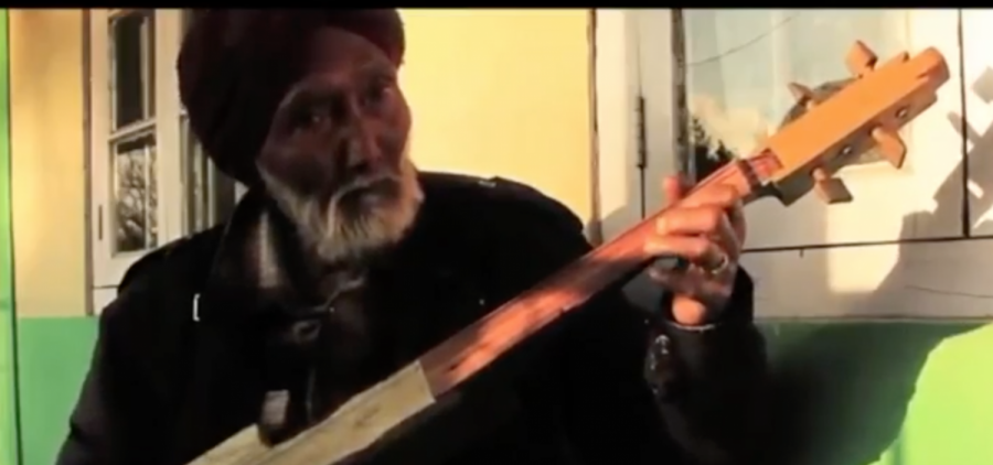 A musician from the Meghalaya region of India plays a folk song.
