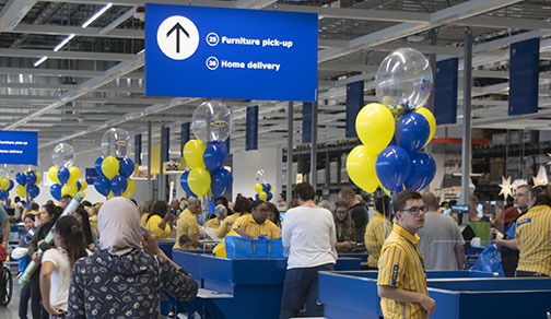 IKEA customers stand in line to purchase furniture and items they found to their liking on Oct. 11, IKEAs opening day. Photo by John Yun