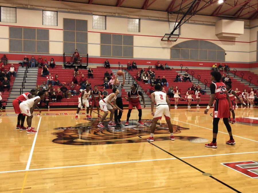 Tigers tip off against Indianapolis Emmerich Manual on Nov. 27. FHS won 64-50. Photo courtesy of Fishers High School athletic website. 