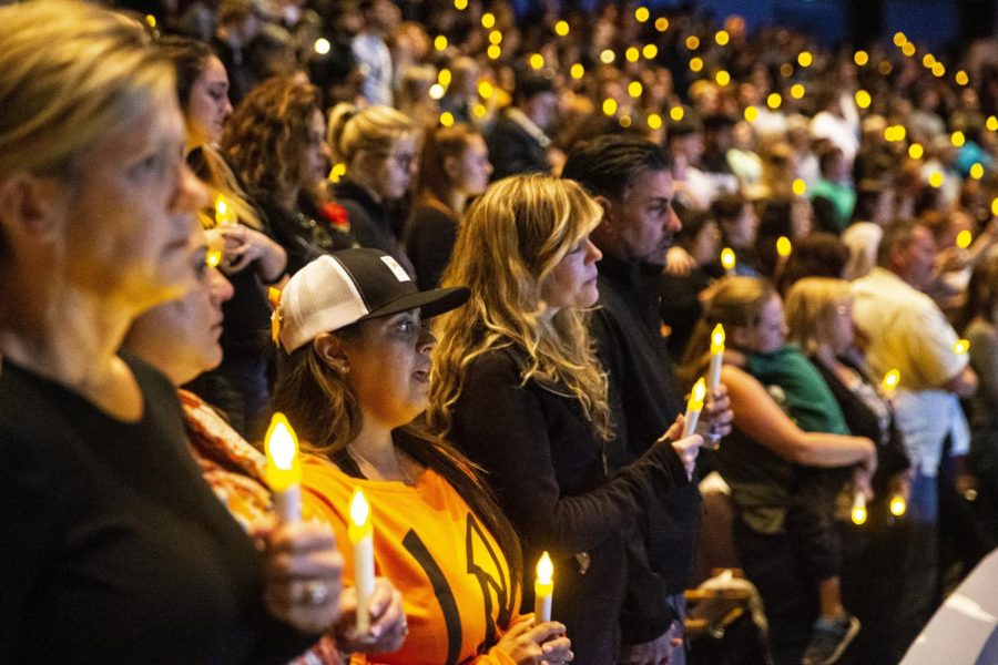 People gather at a candlelight vigil on Nov. 8 to mourn those killed in the Thousand Oaks shooting