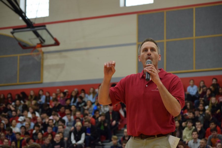 Principal+Jason+Urban+addresses+the+student+body+during+the+student+choice+day+pep+rally+on+March+18%2C+2018.