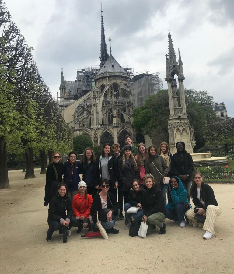 Students+pose+outside+the+Notre+Dame+during+the+France+trip+over+spring+break+on+Apr.+2%2C+2019.