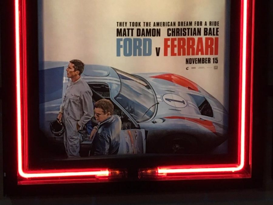 The poster for Ford v Ferrari hangs outside the movie theater.
