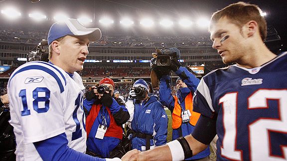 Peyton Manning and Tom Brady show respect to one another following an away game at Gilette Stadium.