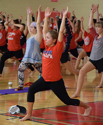 Students participate in a yoga class during student choice day in 2017. 