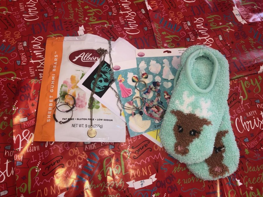 Presents such as slippers and candy 
were received by Alison Casey in a Secret Santa last year. 