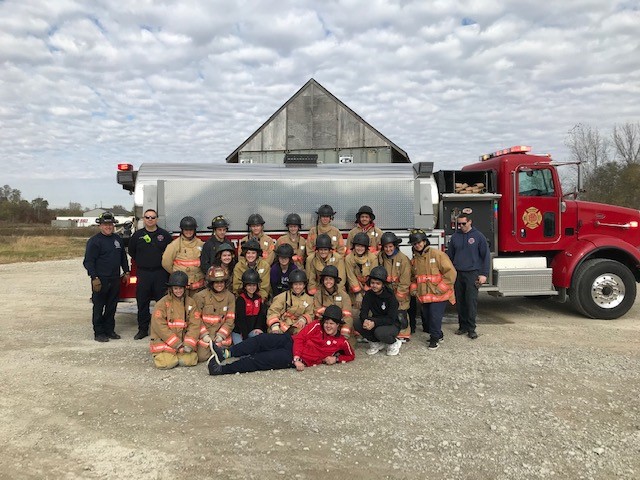 +Academy+students+come+together+for+a+photo+after+completing+their+day+of+training+with+the+Fishers+Fire+Department+in+2019.+