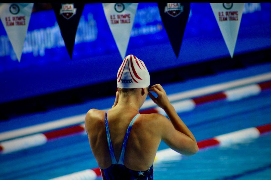 Ramey adjusts her goggles on June 16th, 2021 at the Olympic Trials in Omaha, Nebraska. Ramey finished in the top eight at the Trials.
