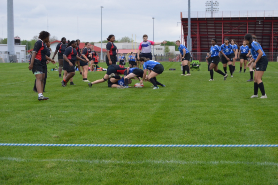 On May 4, Mudsock players participate in a ruck after their ball carrier was tackled. After the ruck, players hoped to move the ball further forward.