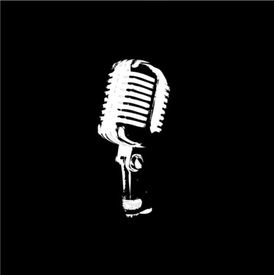 White microphone in front of a solid black background.