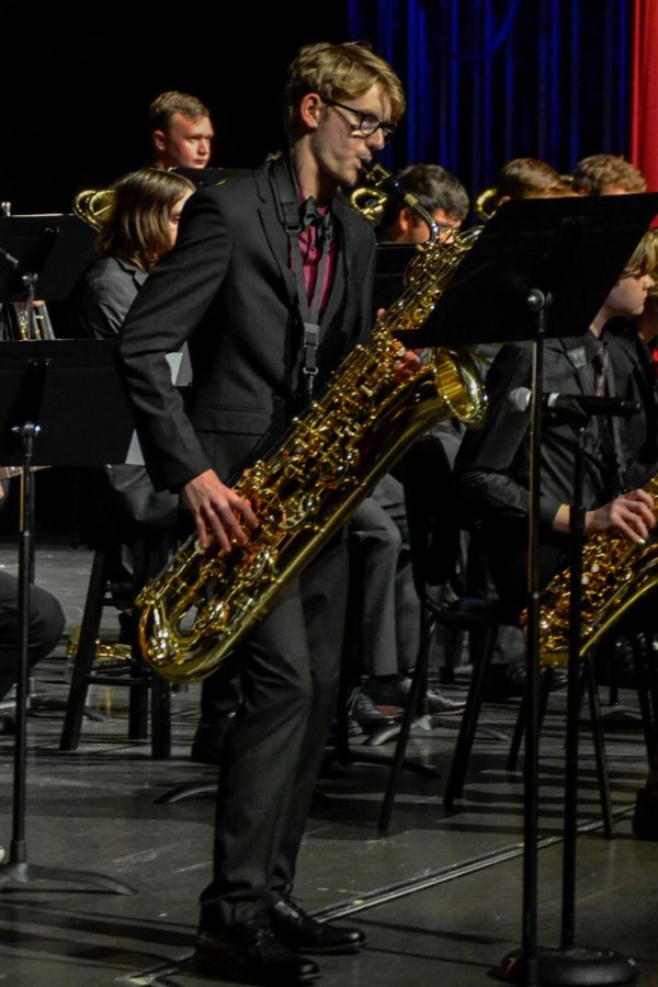 Walker performs an improvised solo on his baritone saxophone. The fall jazz concert took place on Oct. 10, 2022 at Fishers High School.