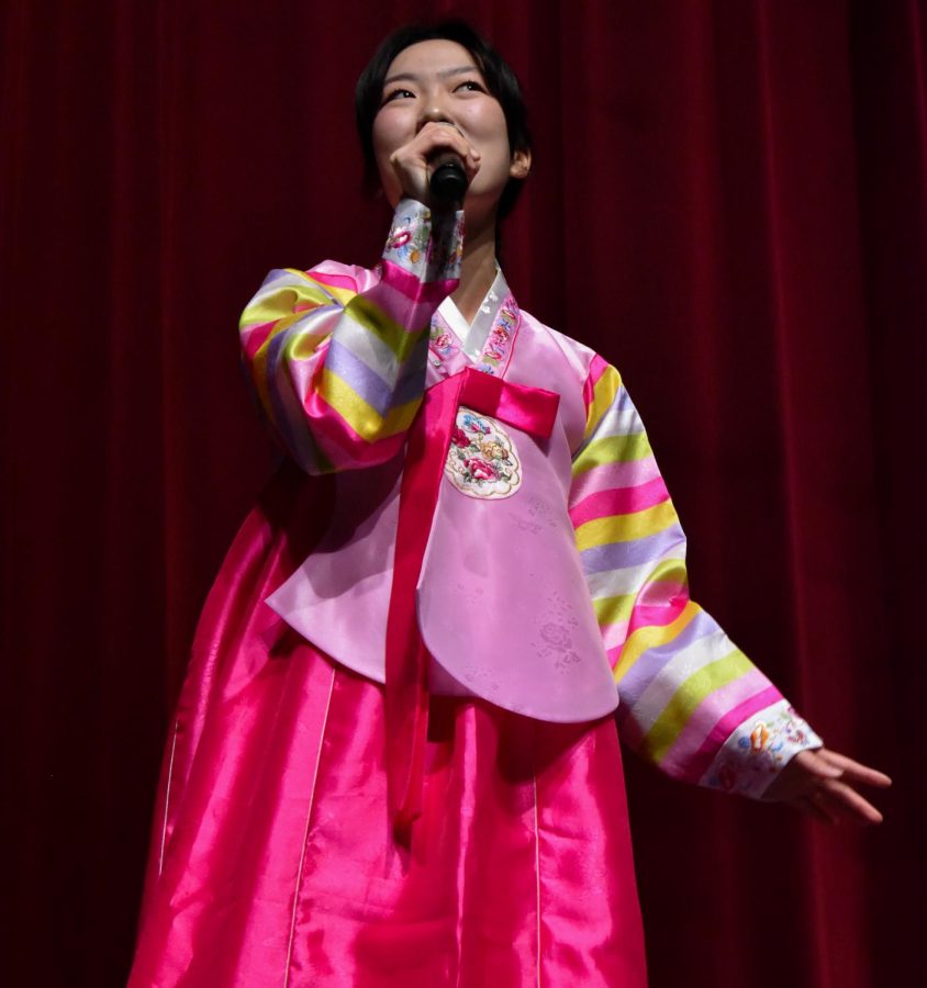 Junior Jocelyn Jun sings ‘Solar System’ by Sung Si-kyung. The International Fair took place on Feb. 24 at Fishers. 