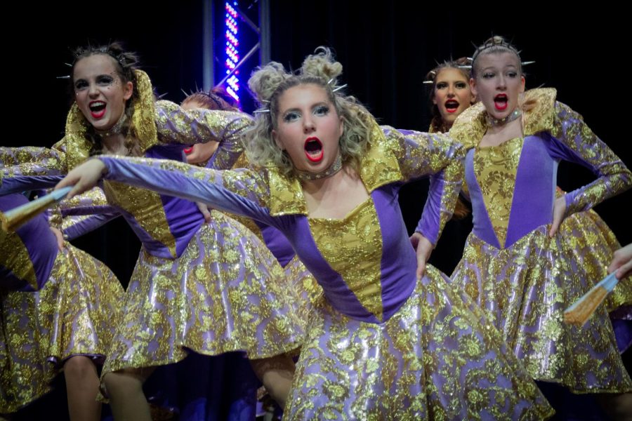 Junior Audrey Ehlin freezes to pose in the middle of Sound’s closing number at Parent Preview Night. Parent Preview Night took place on Feb. 2, 2023.