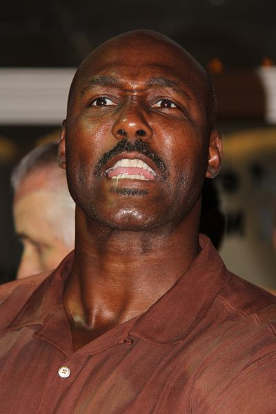 Karl Malone yelling towards a group of people at an unknown event in 2010.