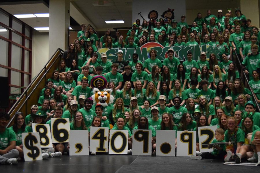 Students attending Riley Dance Marathon on March 17 hold up signs displaying $86,409.92 was donated this year to the organization. Many students, donors and sponsors allowed the club to surpass 2022’s amount raised of $80,180.63.