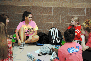 Students sit on the floor during lunch on September 2. Picture taken by Jenna Knutson.