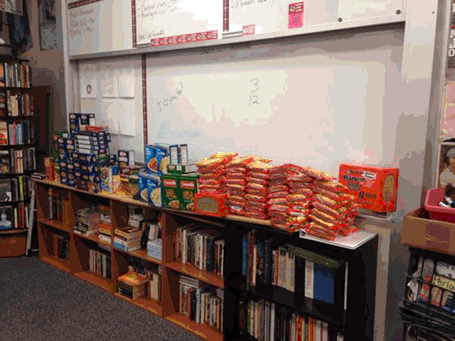 Pasta+is+stacked+on+the+book+shelf+for+the+pasta+bowl+competition.+Picture+by+Rebekah+Hern.