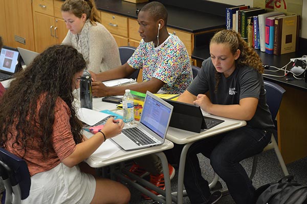 Students use their technology in science class.  Photo by Brooke Keel.