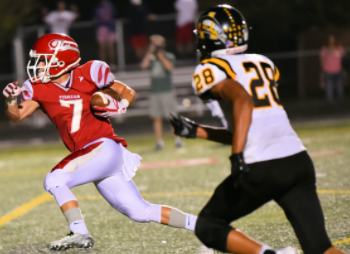 Junior wide receiver Colin Statz runs ball towards the end zone and away from Avon defense on September 22. Tigers win 35-28. Photo courtesy of Fishers High School athletic website.