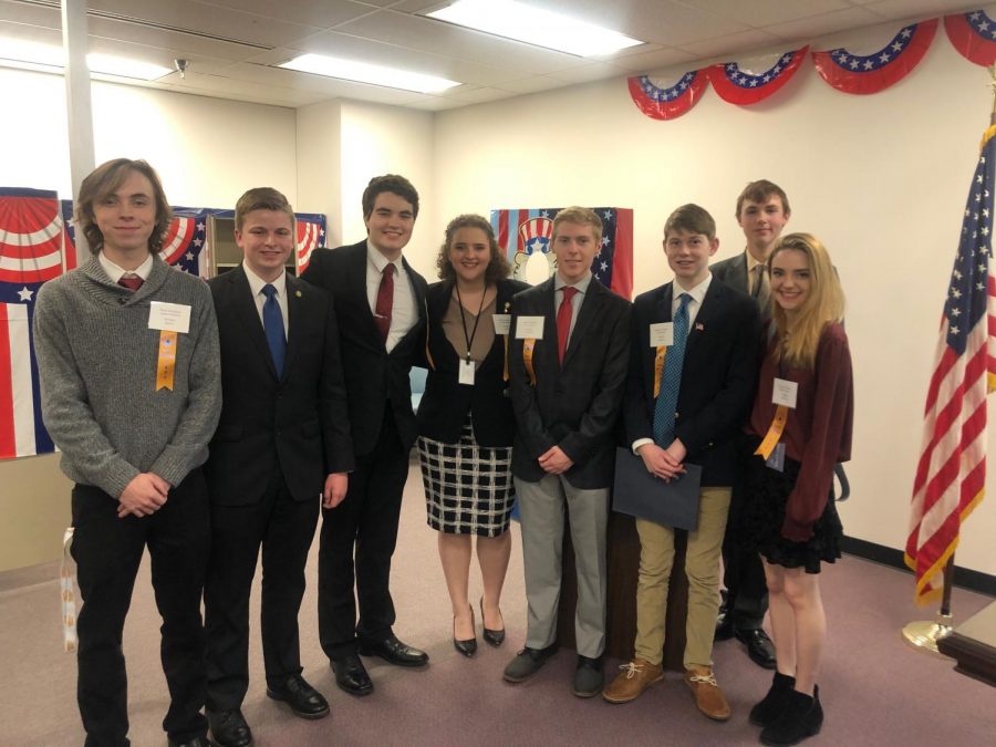 Senior Abbie Schwanke (far right) poses with her fellow members of the paging program. 