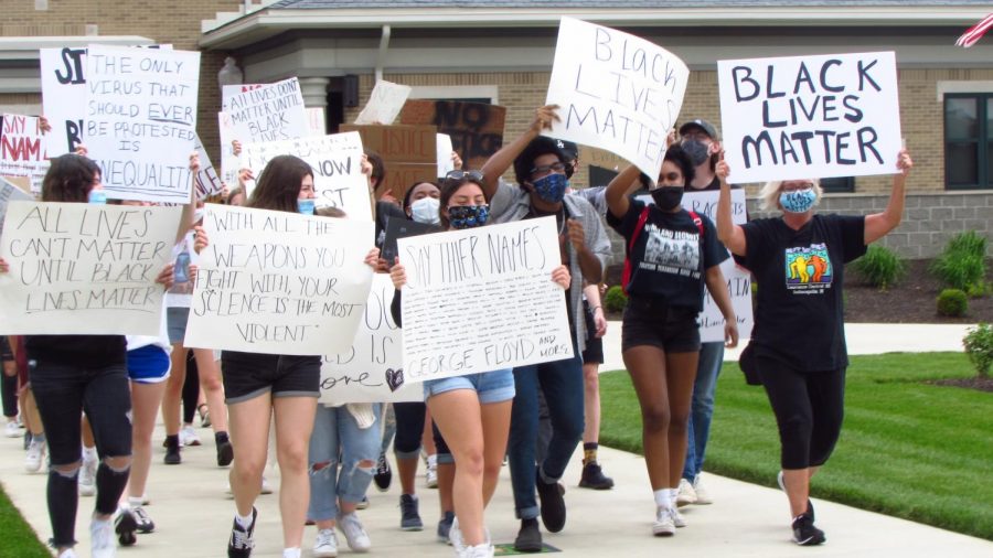 Protesters march around the Nickel Plate Amphitheater in Fishers on June 2 to show support for the Black Lives Matter movement.