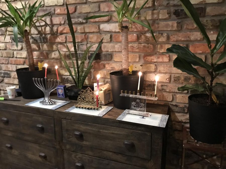 After sundown on Nov. 28, senior Hannah Moore and her extended family light their menorahs and say blessings to celebrate the start of the minor Jewish holiday known as Hanukkah. 