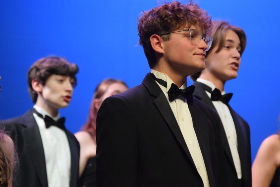 Sophomores Daniel Hobart, Noah Greer and Ryan Mitchell sing “The Music of Living” by Dan Forrest as a part of Electrum’s set. The spring concert was on Saturday, May 14.