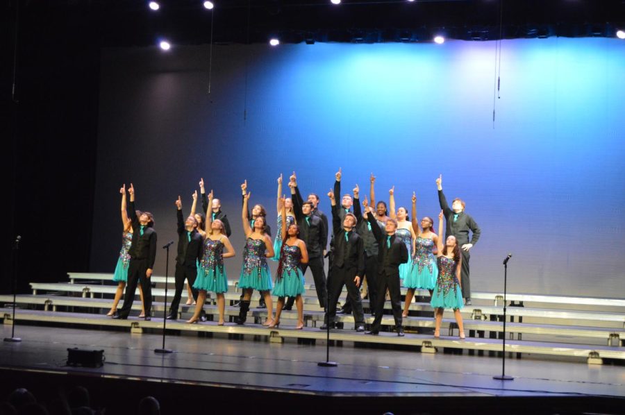 FHS mixed intermediate choir, Cantabile pose as they finish performing their piece “Footloose,” arranged by Kirby Shaw. The spring concert was on Saturday, May 14. 