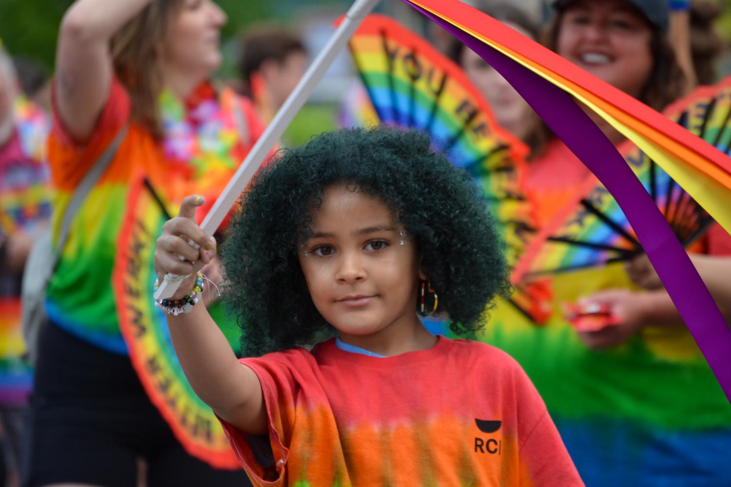 A child waves a colorful ribbon wand in the Indy Pride Parade. The Indy Pride Parade took place on Saturday, June 11, 2022.