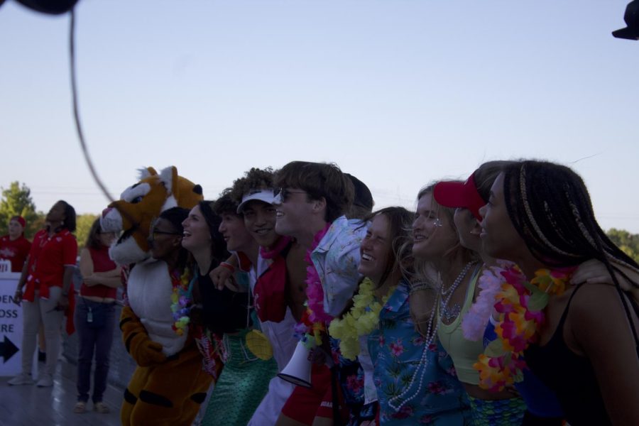 Dressed in beach attire to match the theme, spirit leaders bring the fun by leading chants and dancing with the crowd.