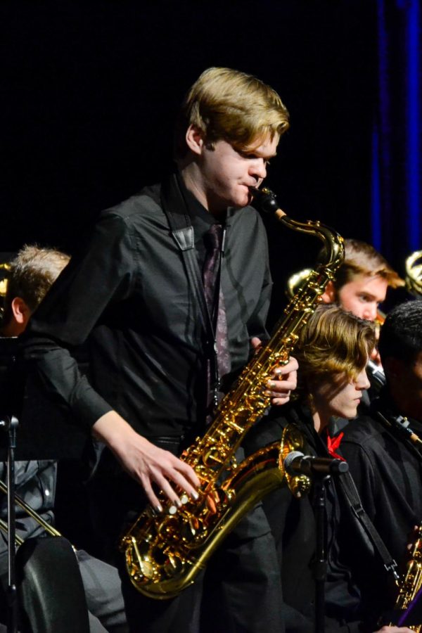 Junior Luke Trahin performs a solo on the tenor saxophone. The fall jazz concert took place on Oct. 10, 2022 at Fishers High School.