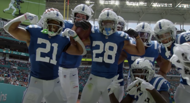 Colts+players+celebrate+after+a+touchdown+against+the+Miami+Dolphins+on+October+3%2C+2021.+