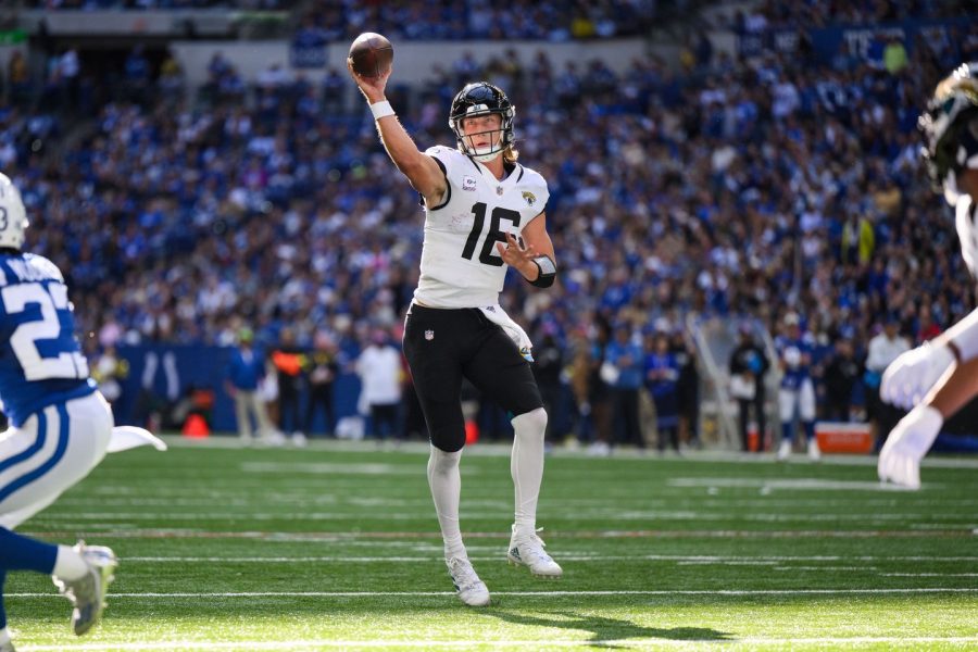 Trevor+Lawrence+throws+a+no-look+pass+against+the+Colts+in+a+34-27+week+6+loss+to+the+Colts+despite+his+three+total+touchdowns+on+Oct+16%2C+2022.