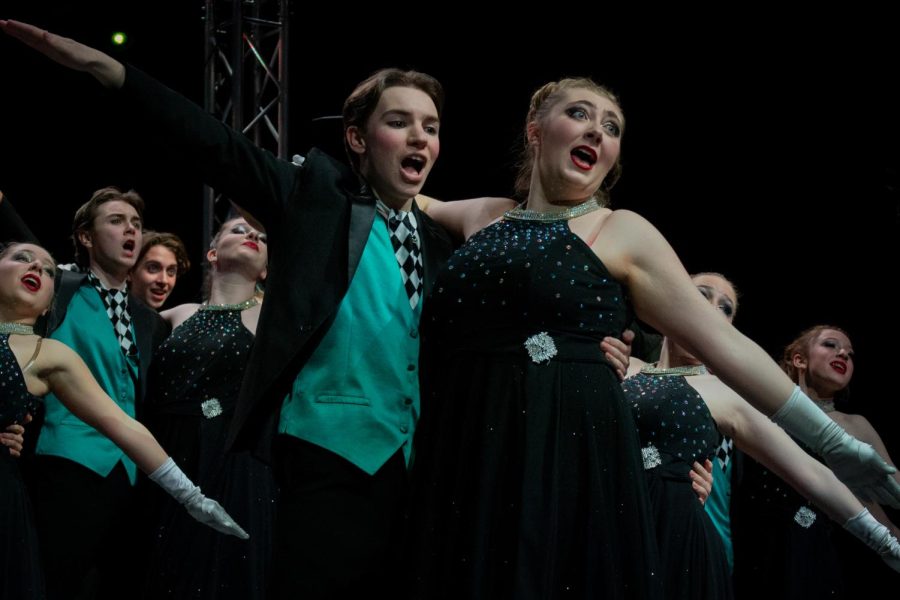 Juniors Justin Zeisig and Grace Arb act as if they are in a ballroom for Electrum’s first number on Parent Preview Night. Parent Preview Night took place on Feb. 2, 2023.
