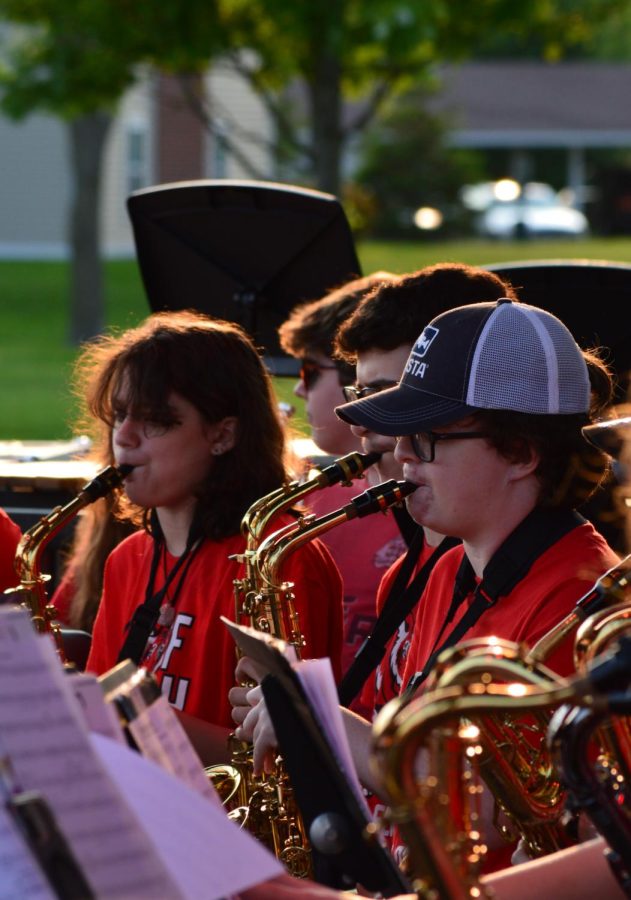 The Symphonic Gold Band saxophone section playing the piece “Disney Blockbusters.” The spring band concert took place on Wednesday, May 18 at Nickleplate Amphitheater.