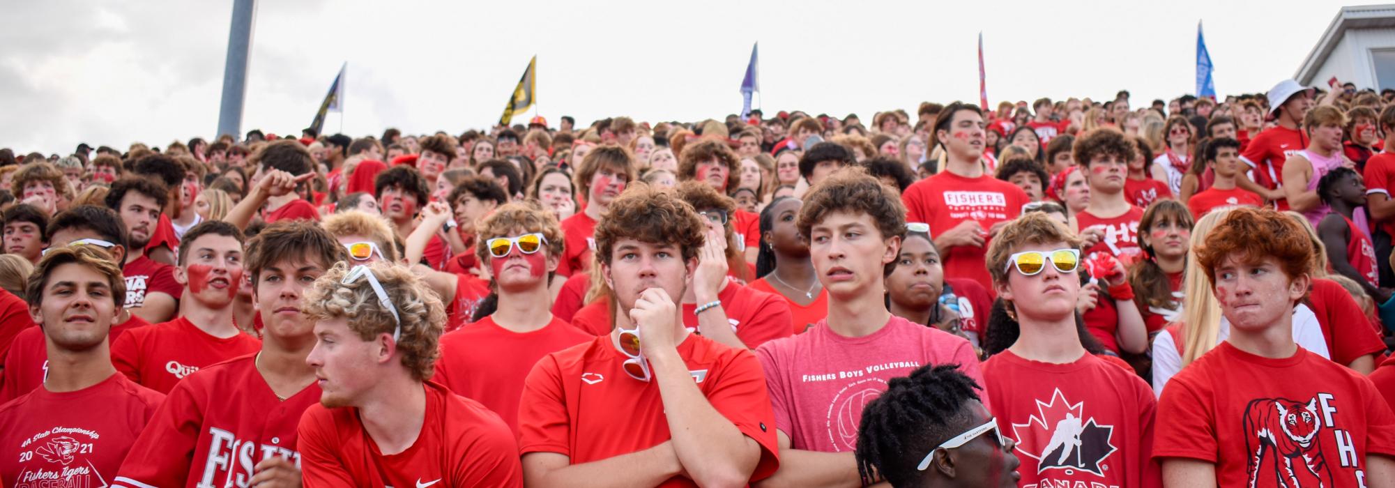 Members of the student section watch the football game. “As a spirit leader, my role is to keep the energy hype and positive no matter what the score is,” Baranovsky said. “We all want the same thing: to beat HSE. I always want to make sure that we are cheering loud and getting all the classes involved.” Fishers lost the game to HSE with a final score of 35-34 on Sept. 8, 2023.