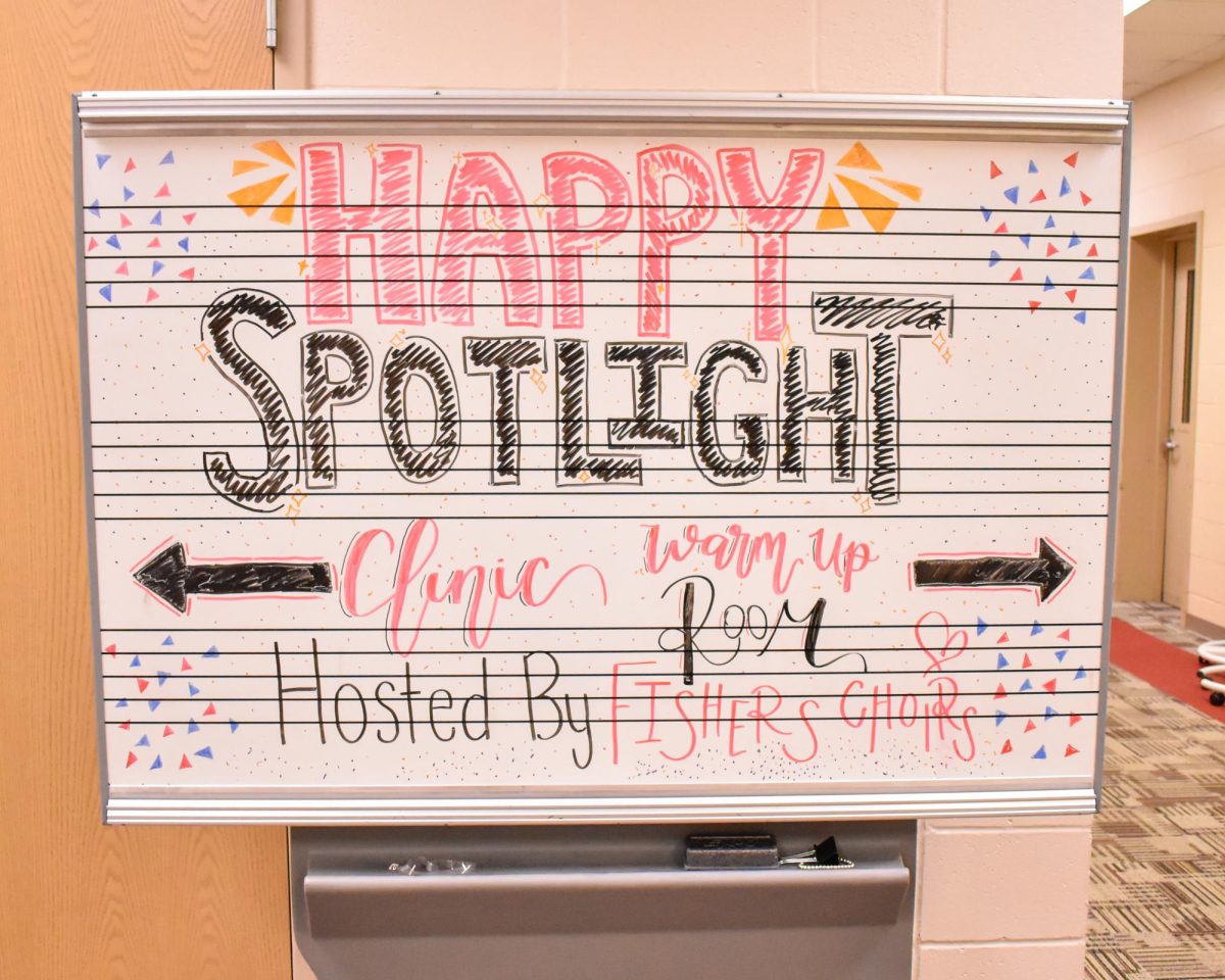 A sign welcoming visiting show choirs is seen in the performing arts wing at Fishers High School on the day of Silver Spotlight. Silver Spotlight took place on Feb. 3, 2024. 