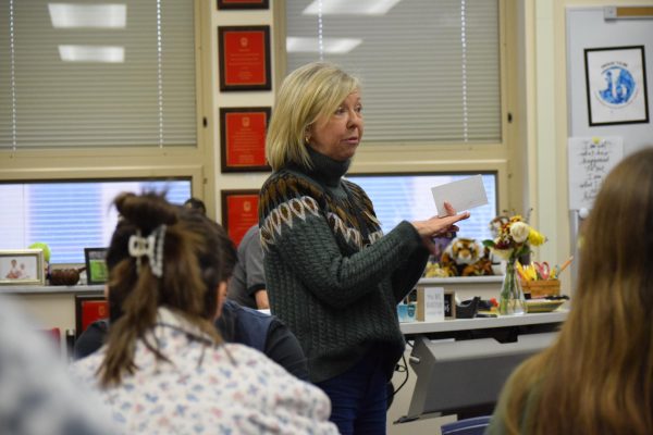 Ball State Professor Pam Marshall instructs the Principles of Teaching college-level class on the final presentation project on Nov. 21.  The students in this course receive college credit for EDEL100 by cadet teaching in Hamilton County schools three times a week.