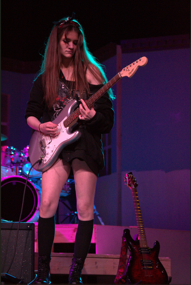 Senior Kara Colgan performing with her band at the FHS talent show on March 12.