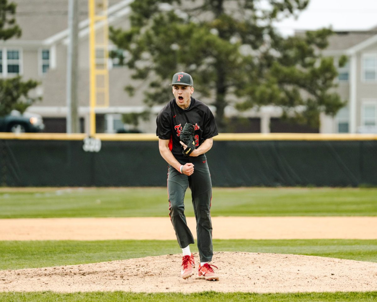 Werner celebrates a strikeout against the Noblesville Millers in a baseball game on April 18. “My mindset is to just go up there and throw strikes, I know that my defense has my back,” Werner said. The Tigers won 2-1.