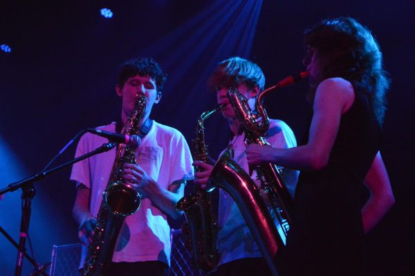 Junior Eli Shaffer, junior Jackson Puls and senior Vivian Arney play brass for Speaking Sheep during the Spring Thing benefit concert on May 3. 