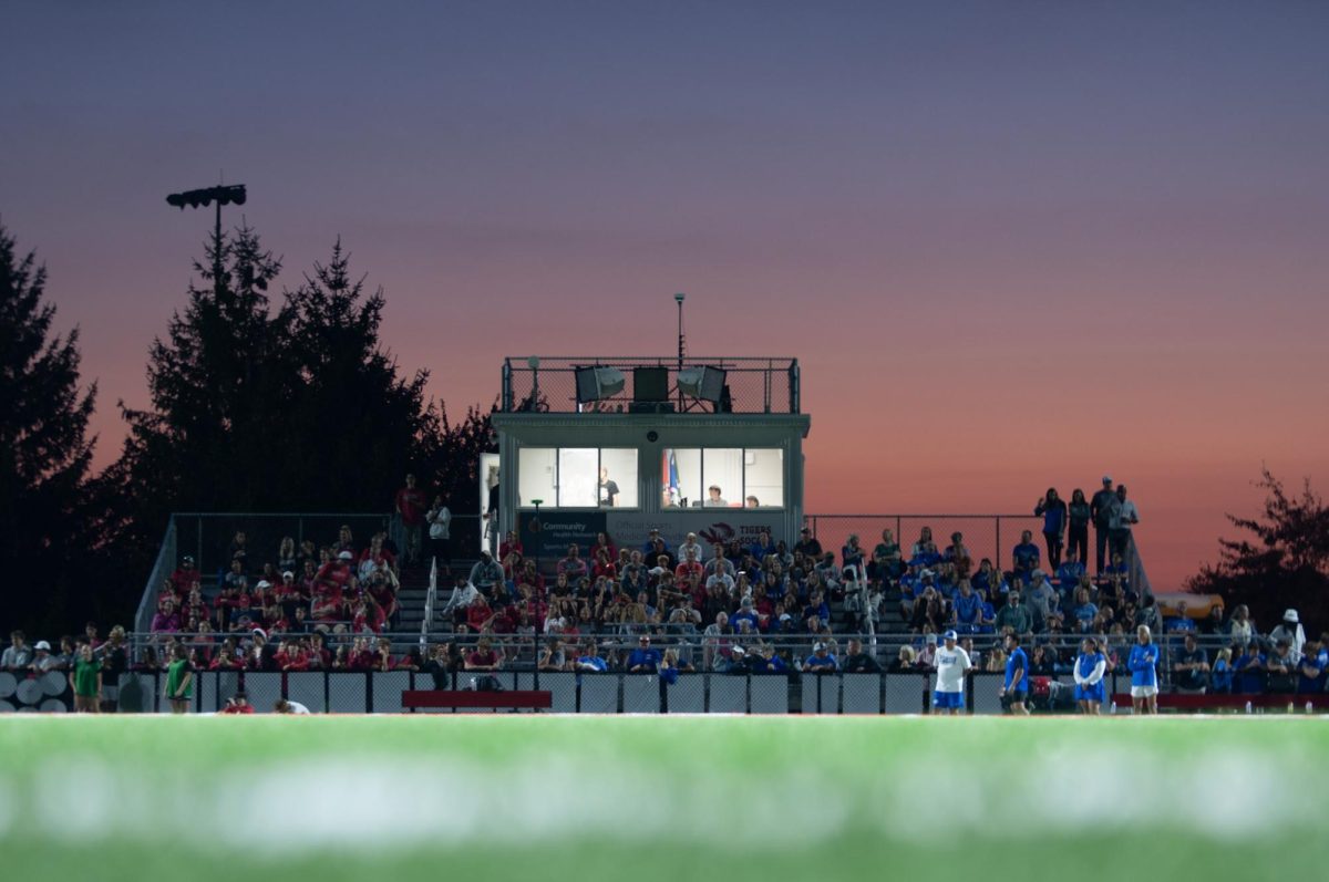 The Fishers Tiger soccer stadium stands during the HSE vs. Fishers game on Sept. 10. The crowd and press box both watch as the ball is being played on the Fishers half. Photo courtesy of David Mott. 