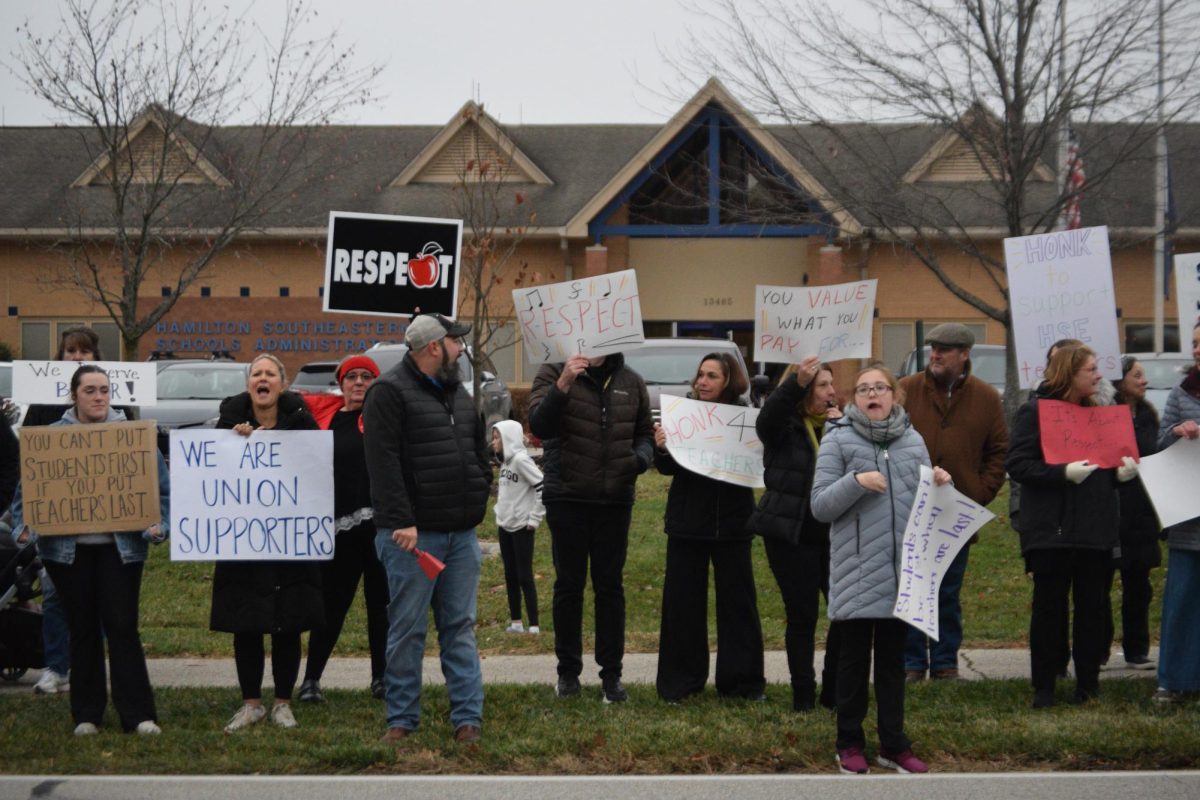 A group of attendees picketing outside of central office on Wednesday, Nov. 19. Photo by Maddie Davis. 
