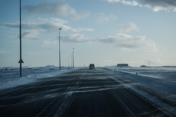Image depicts an icy road in Winter. Photo courtesy of Creative Commons.
