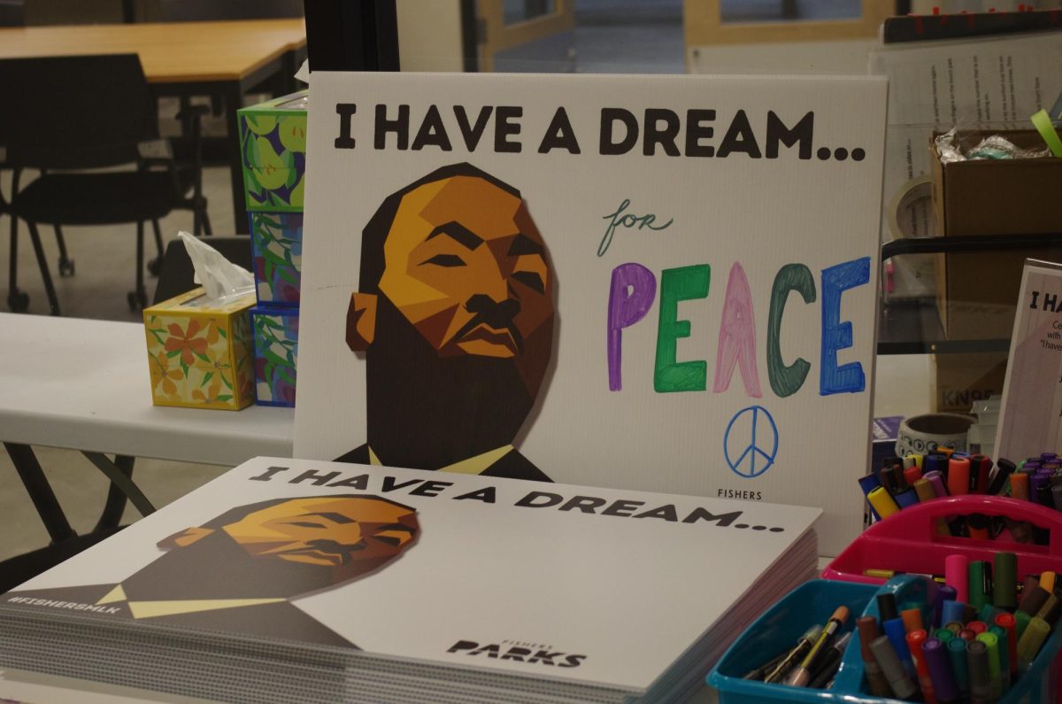 A yard sign at Fishers Parks on Jan. 13 showing Martin Luther King Jr.’s face that says, “I have a dream for PEACE.” The word PEACE is hand drawn on the sign. Photo by Evelyn Rose. 
